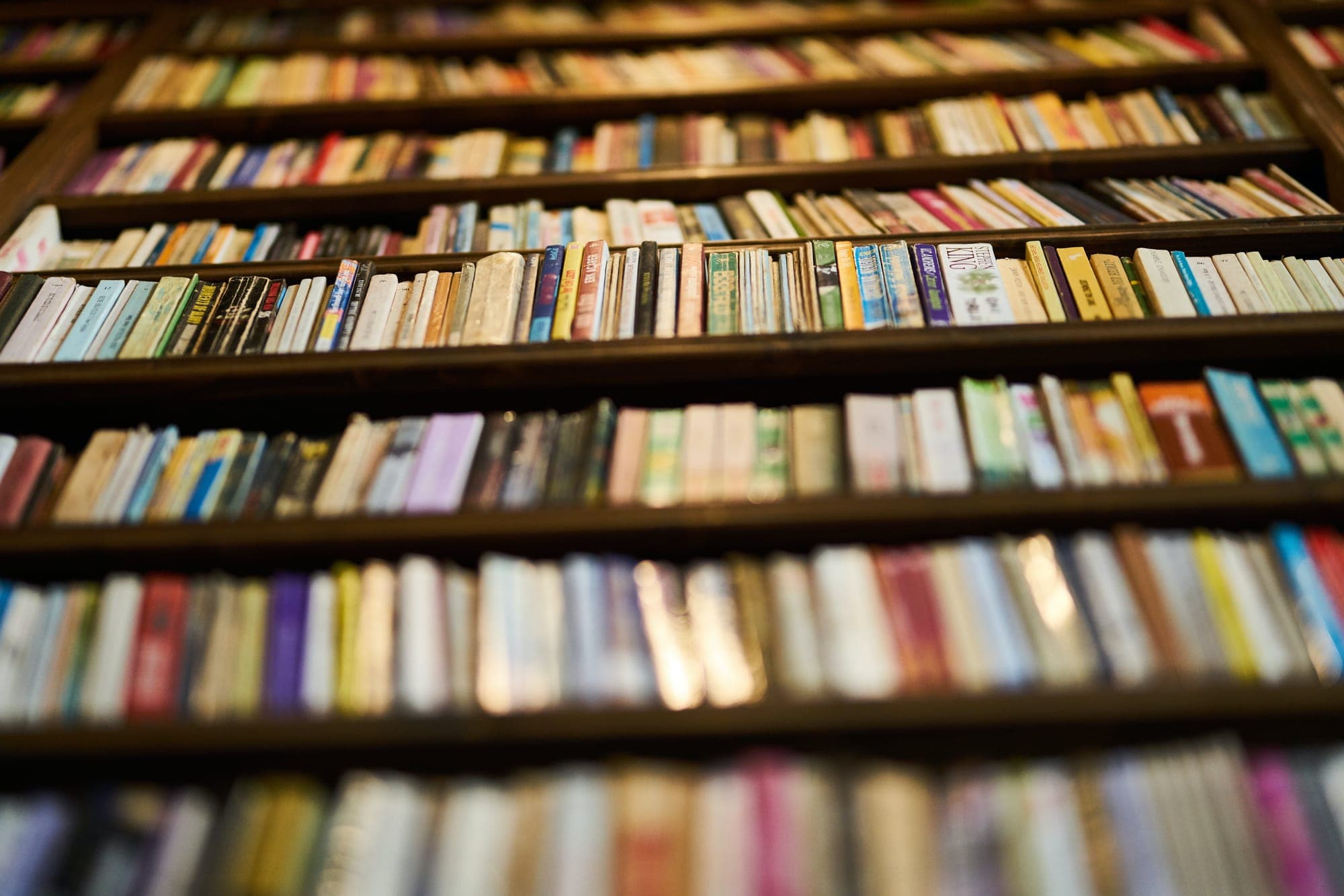 Photo of tall bookshelves full of books